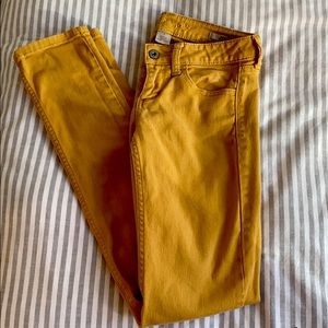 Mustard skinny jeans